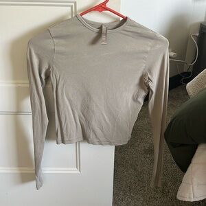 Skims long sleeve cream top size XS